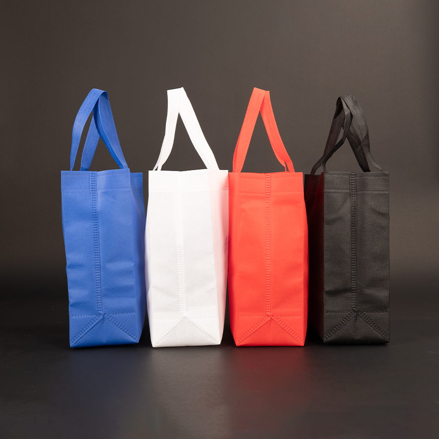 Bolsa TNT reutilizable "SAUL" con costuras termoselladas, asas 38 x 2.5 cm. - Imagen 16